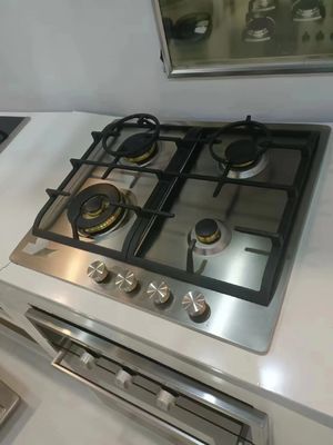 Kookplaat met metalen knop en koperen spuitstuk 4 gas 1 enkel elektrisch infrarood keramisch hob